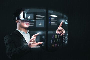 Asian businessman using vr virtual reality headset interacting internet browser window with an...