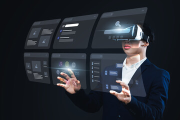 Asian businessman using vr virtual reality headset interacting internet browser window with an...