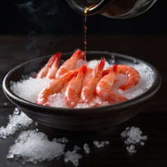 plate of fried prawns on dark table, top view