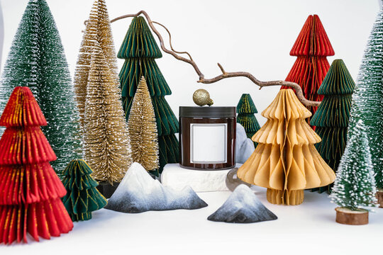 dark jar with lid on the background of Christmas decorations, side view