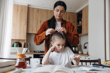 Mother Braiding Hair as Daughter Studies
