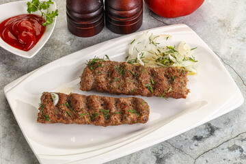 Kebab with beef served onion