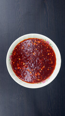 Spicy Chili Sauce Served in a Rustic Ceramic Bowl