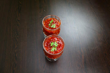 Traditional Rich and Spicy Chili Sauce on a Wooden Table