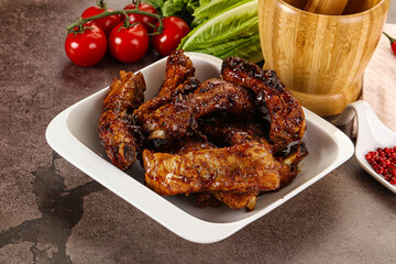 Grilled pork ribs in barbecue sauce