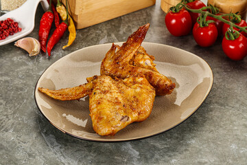 Tasty roasted chicken wing with spices