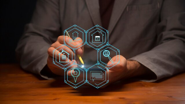Cg hexagons with symbols of the real estate market against the background of a man with a smartphone and a stylus at the point of contact of which there is a bright light point