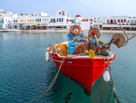 Red fishing boat on the island of Mykonos in Greece