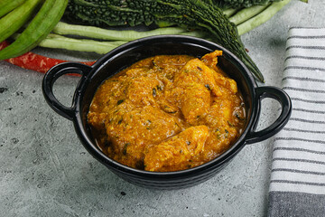 Spicy chicken masala in the bowl