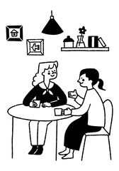 Fototapeta premium Two women having a lively conversation while drinking_2