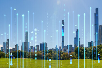 New York cityscape with futuristic hologram of data and arrows concept on a bright sunny day....