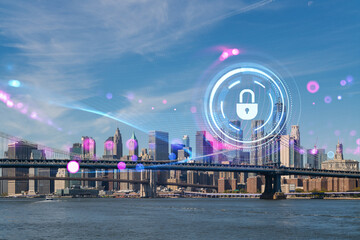 New York City skyline with Brooklyn Bridge, overlaid with a futuristic security hologram. Double...
