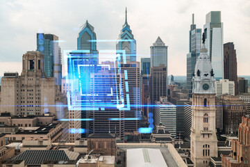 Philadelphia skyline with a hologram overlay on cityscape background. Double exposure