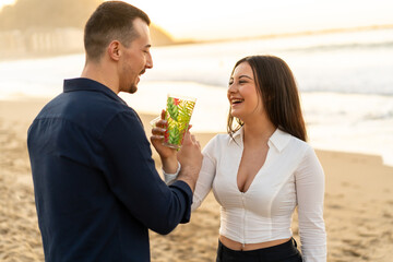 Romantic toast on the beach during sunset