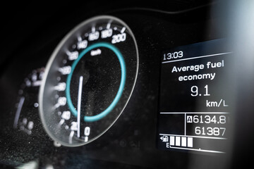Average fuel consumption of a car displayed on car dashboard