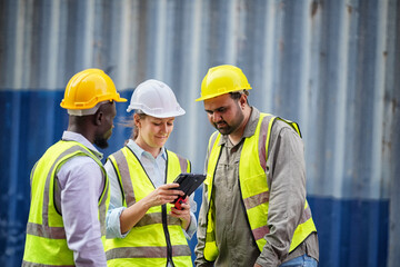 Foreman control loading containers box from cargo freight ship for import export, Foreman control industrial container cargo freight ship, Business logistic concept, Import and export concept