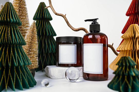 dark jar with lid and dispenser on the background of Christmas decorations, side view