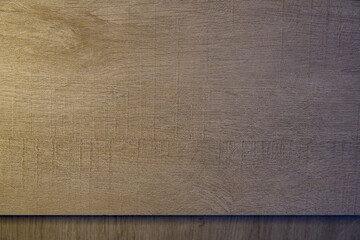 Wooden surface with a brownish color. Rough texture