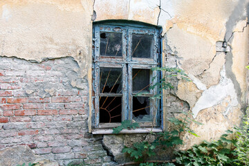 broken window in abandoned house