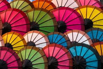 In Luang Prabang, the Aligned Umbrella Dominates the Market in Style