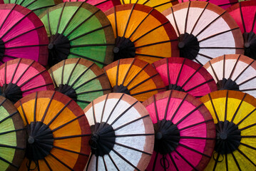 In Luang Prabang, the Aligned Umbrella Dominates the Market in Style