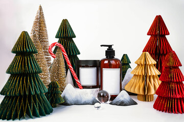 dark jar with lid and dispenser on the background of Christmas decorations, side view