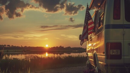 A serene image of the American flag at sunset, draped over a camper van, capturing the essence of a peaceful journey through America's heartland, isolated - obrazy, fototapety, plakaty