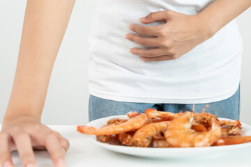 food allergies, women have reactions itching and redness after eating shrimp, seafood allergy,...