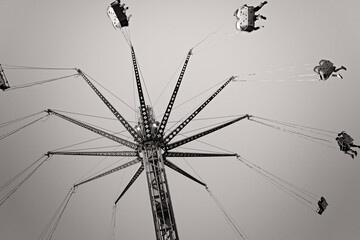 high flyer swing, carnival fair show festival, amusement park ride, black and white monochrome,...