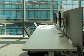 Interior of modern empty office building.Open ceiling design.Equipped with automatic lifting table and LCD screen.