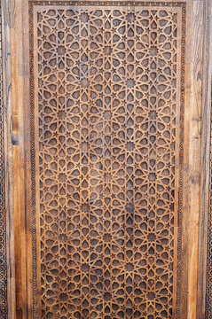 arabic Uzbek Islamic patterns ornament with stars on a modern wooden carved door in Uzbekistan in Tashkent
