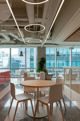 Interior of modern empty office building.Open ceiling design.Equipped with automatic lifting table...