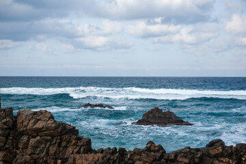 View of the winter sea at the rocky seaside