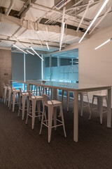 Interior of modern empty office building.Open ceiling design.Equipped with automatic lifting table...