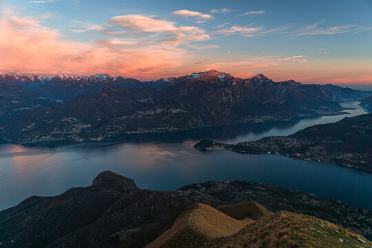 The lights and colors of the sunset on Lake Como, near the town of Tremezzo, Italy - December 24, 2023