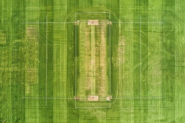 Aerial view of empty cricket pitch with ground