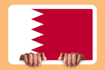 Hands holding a white frame with Bahrain flag, independence day idea, two hands and frame