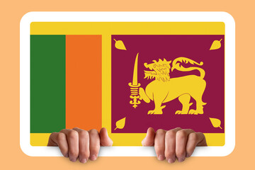 Hands holding a white frame with Sri Lanka flag, protest or social issues in Sri Lanka