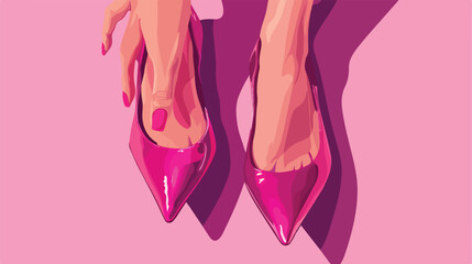 Female hands holding stylish shoes on pink backgroun