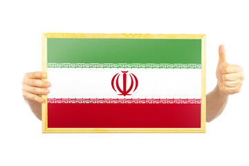 Hands holding a frame with Iran flag, celebration or victory concept, approvement or success in 