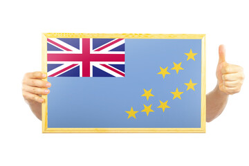 Hands holding a frame with Tuvalu flag, independence day idea, two hands and thumb up, celebration 