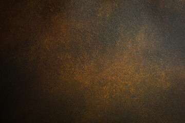 Dark brown textured surface. Free space for text. Rusty metal background.