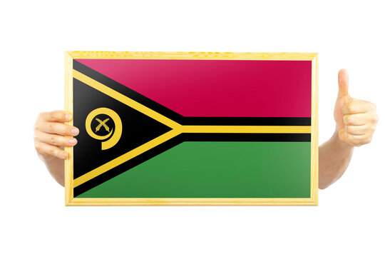 Hands holding a frame with Vanuatu flag, independence day idea, celebration or victory concept