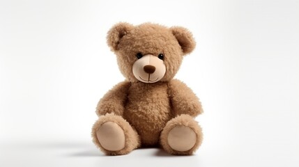 Obraz premium Beautiful teddy bear is sitting isolated on white background.