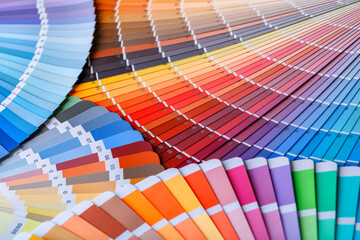 Color wheel for choosing paint tone.Painter and decorator work table, color swatches