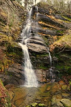 The Uguna waterfall. One of the jewels of the Gorbeia Natural Park. Zeanuri, Bizkay, Euskadi, Spain. It is a magical landscape, surrounded by lush forests. Water with silk effect.