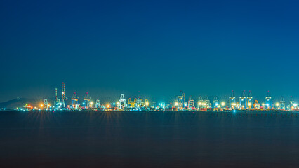 Night view of Laem Chabang Port background.