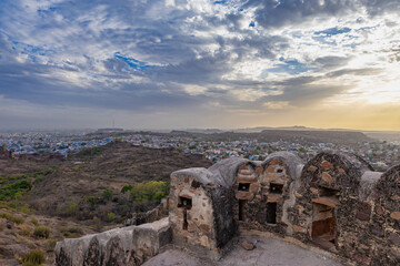 Fototapeta premium city view with ancient fort wall and dramatic sky at evening from different angle