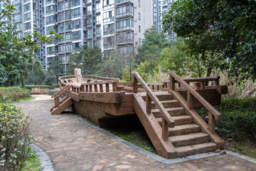 a wooden boat in the park