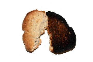 Very Burnt Bread Roll Torn or Cut in Half Toast Close Up Texture